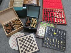 A BOX OF ASSORTED CHESS SETS