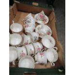 A BOX OF ASSORTED ROYAL ALBERT FLOWERS OF THE MONTH CUPS AND SAUCERS