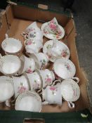 A BOX OF ASSORTED ROYAL ALBERT FLOWERS OF THE MONTH CUPS AND SAUCERS