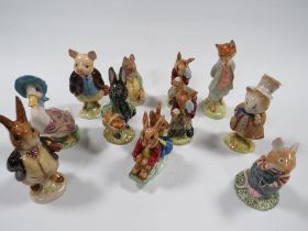 A COLLECTION OF BEATRIX POTTER AND BUNNYKINS FIGURE TO INCLUDE TWO GOLD STAMP EXAMPLES AND SOME