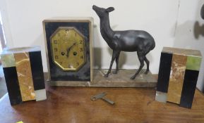 AN ART DECO FRENCH CLOCK GARNITURE BY VAROLD - TELLIER AMIEN, the clock of angular design with a