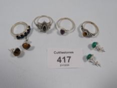 A COLLECTION OF VINTAGE 925 SILVER RINGS TO INCLUDE TIGERS EYE, AMETHYST, GARNET ETC