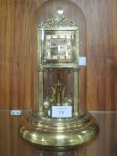 A DOMED MANTLE CLOCK