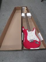 A SQUIRE FENDER BULLET STRAT WITH THREE SINGLE COIL PICK UPS IN CHERRY RED FINISH