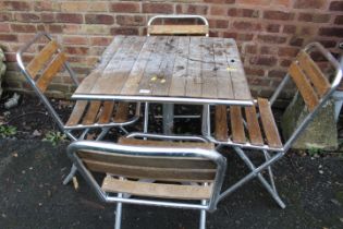 AN ALUMINIUM / HARDWOOD CAFE STYLE PATIO / GARDEN TABLE SET WITH FOUR FOLDING CHAIRS