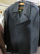 A RAIL OF VINTAGE CLOTHING TO INCLUDE JACKETS