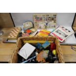 A BASKET OF ASSORTED COLLECTABLE TO INCLUDE A GAY VENTURE STAMP ALBUM AND CONTENTS