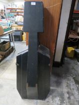 A VINTAGE COFFIN GUITAR CASE