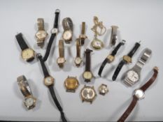 A BAG OF ASSORTED WRIST WATCHES