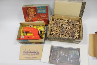 A VULCAN MINOR CHILD'S SEWING MACHINE IN ORIGINAL BOX TOGETHER WITH A VICTORY JIGSAW PUZZLE (