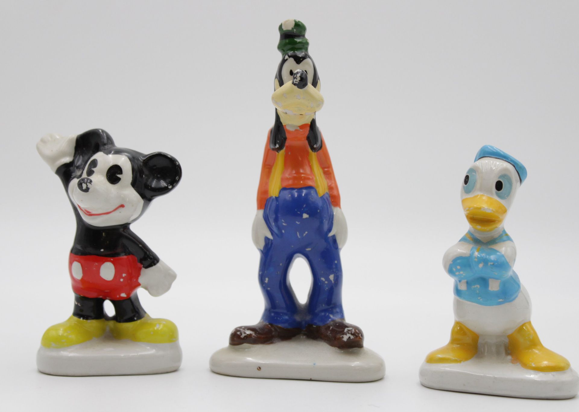 3x div. Walt Disney-Figuren, Mickey, Donald und Goofy, älter, teilw. berieben, Goofy an Hut bestoss