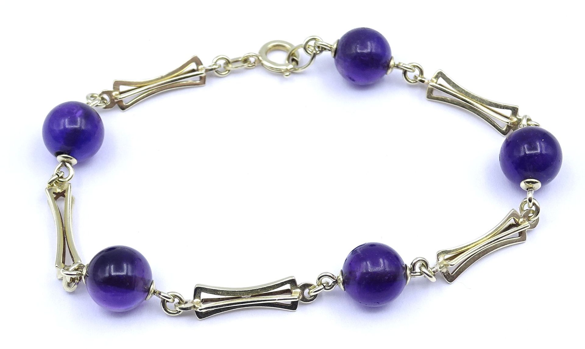 Goldarmband 0.585 mit Amethyst Kugeln, L. 20cm, 10,5g.