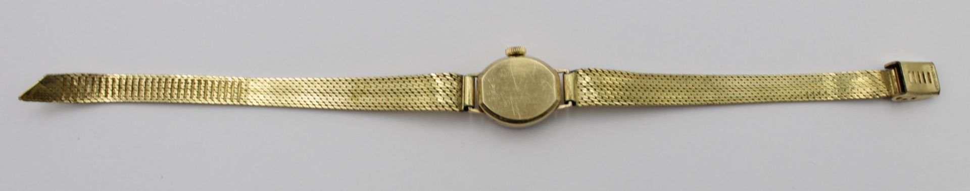 Damen-Armbanduhr, Bifora, 585er GG Gehäuse, Werk läuft, 1,4 x 1,5cm. - Bild 4 aus 4