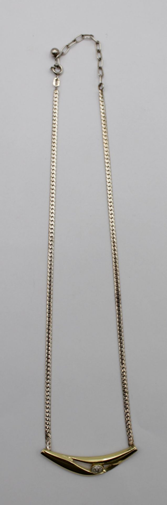 925er Silber-Collier, klarer Stein, teilw. goldfarben, 10,9gr. , L-48cm.