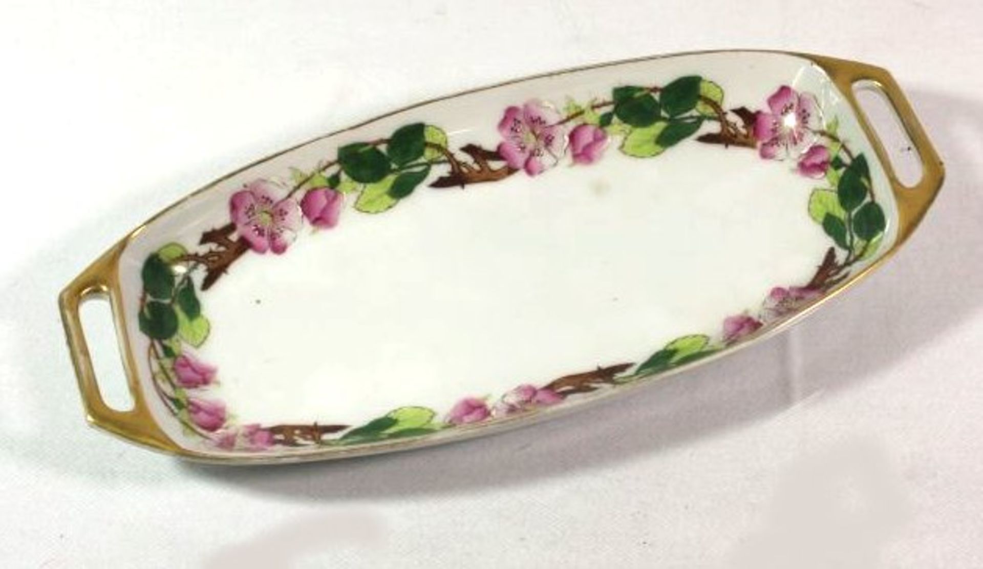 kl. ovale Schale, florale Bemalung, um 1910, 26 x 11cm.