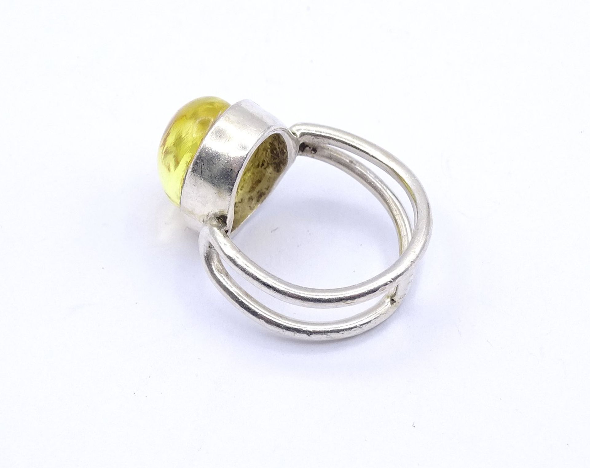 Ring mit einem Bernstein Cabochon, Silberfassung, ungestempelt, Silber gepr., 7,0g., RG 55 - Bild 4 aus 4