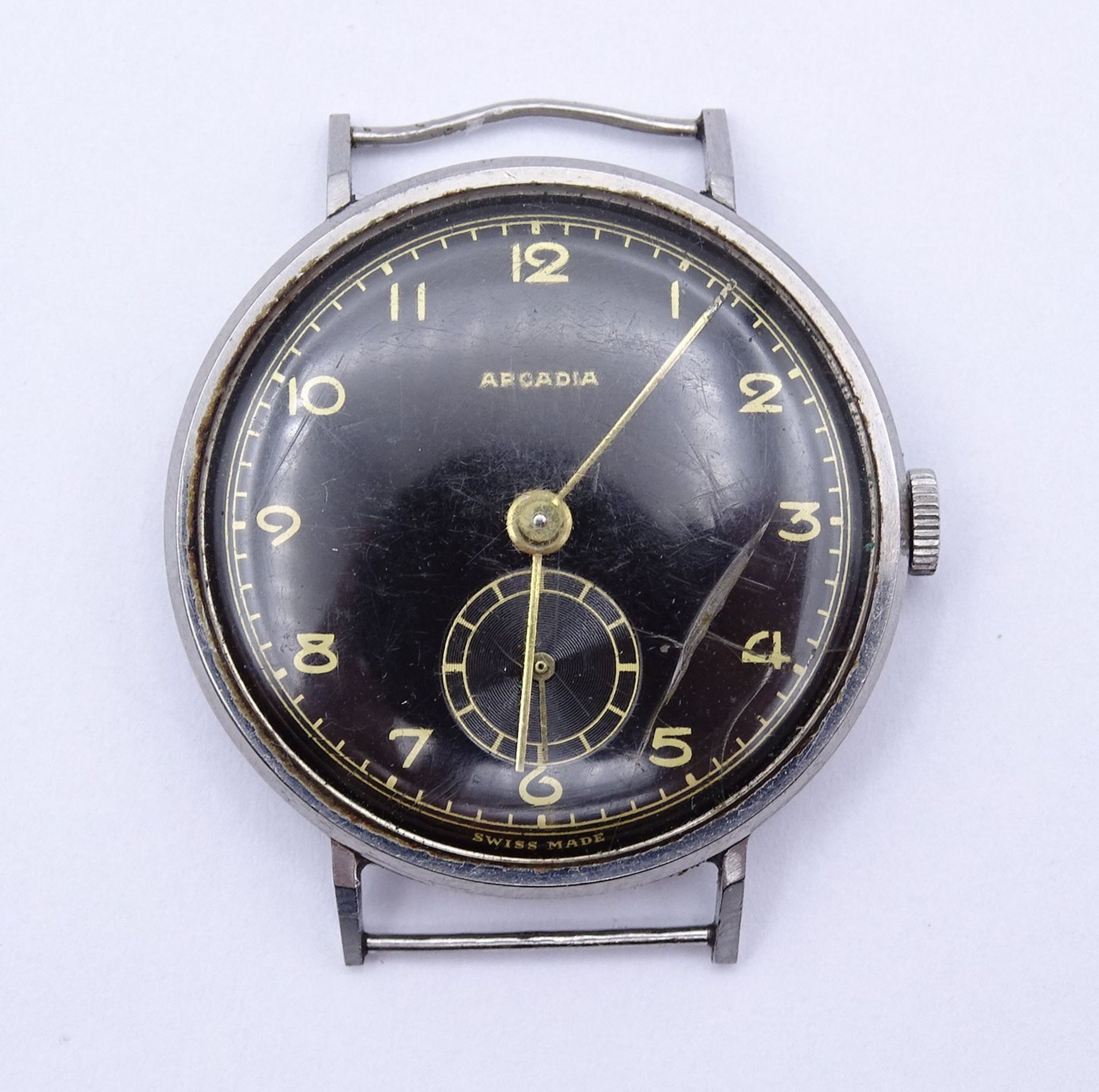Armbanduhr "Arcadia", mechanisch, Werk läuft, D.32mm, Glas mit Riss, Alters- und Gebrauchsspuren