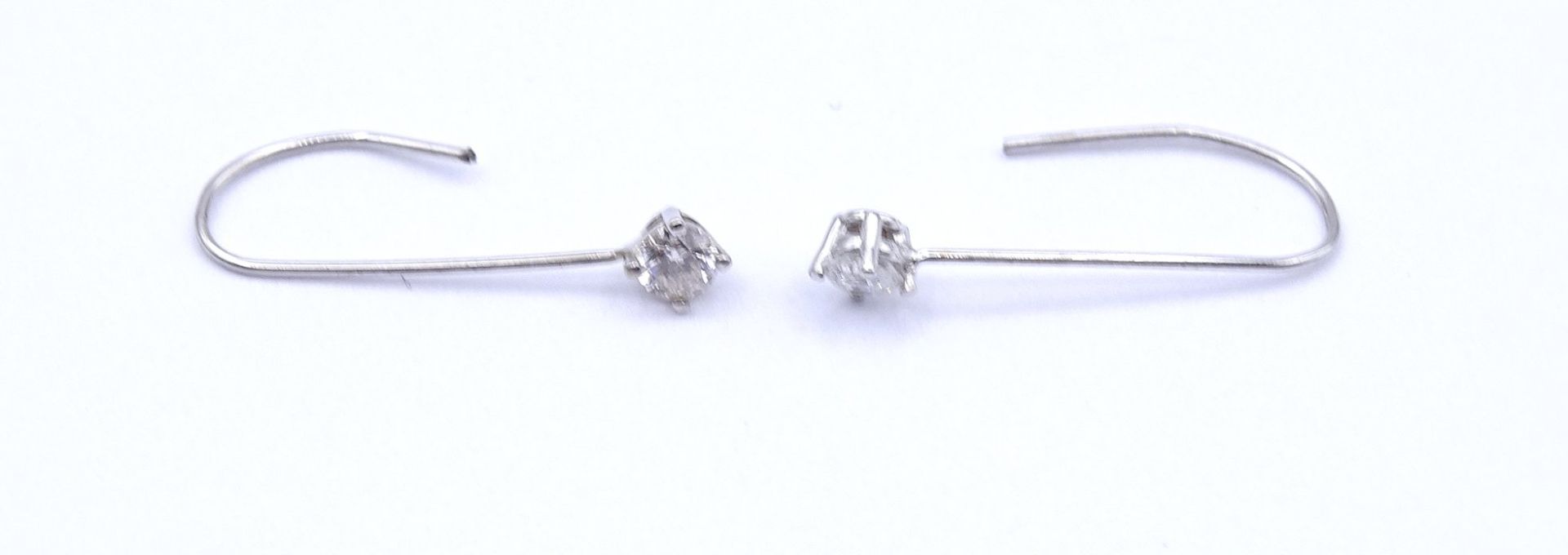 Paar Ohrhänger mit Diamanten 0,18ct., WG 14K ungest., L. 1,7cm, zus. 0,27g. Gold geprüft - Image 2 of 3