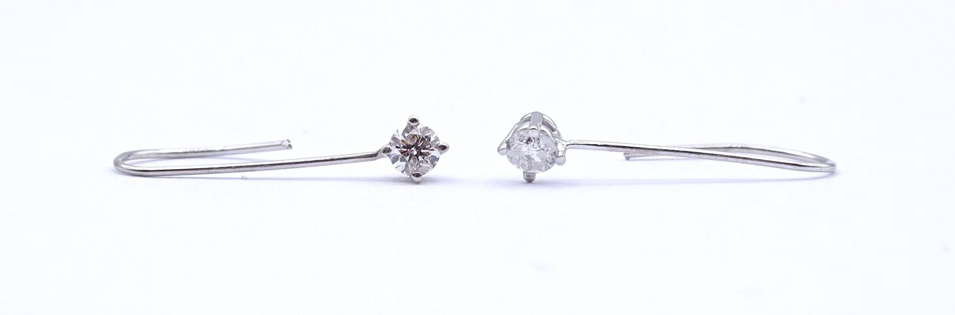 Paar Ohrhänger mit Diamanten 0,18ct., WG 14K ungest., L. 1,7cm, zus. 0,27g. Gold geprüft