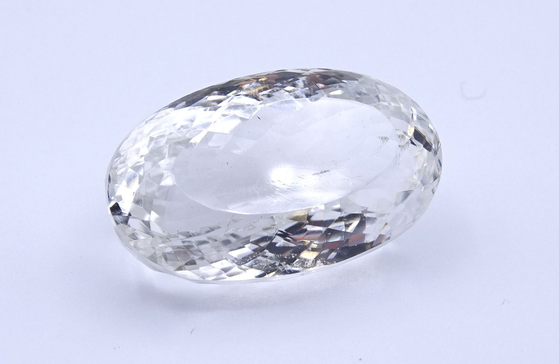 klarer Bergkristall, 85ct., oval facc. 35,4x21,2x16,7mm - Bild 3 aus 4