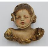 Wand-Putto mit Zahnweh, gemarkt "37a, F.M.M.", älter, wohl Stuck?, ca. H-15,5cm.