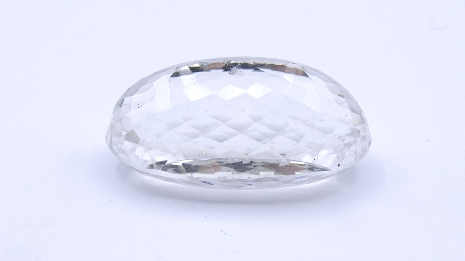 klarer Bergkristall, 85ct., oval facc. 35,4x21,2x16,7mm - Bild 4 aus 4