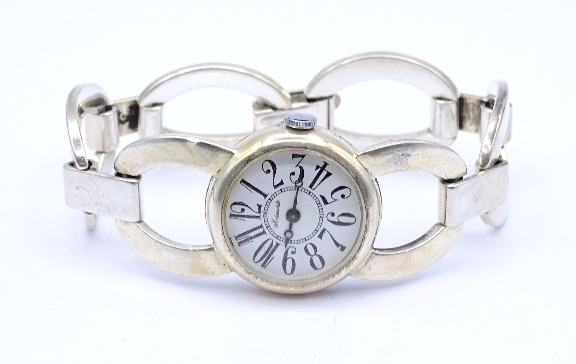 Damen Armbanduhr "Scheurle", Vollsilber 835/000, mechanisch, Werk läuft, D. 25mm, ges.Gew. 47,8g.