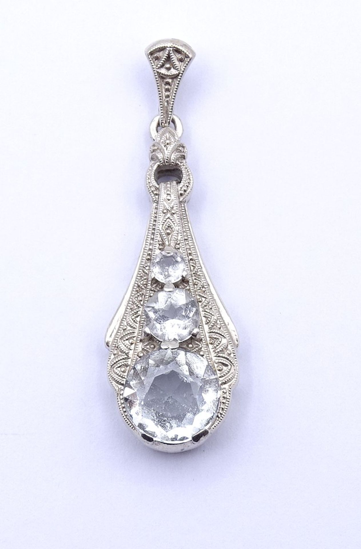 Art Deco Anhänger mit rund facc. klaren Steinen, Silber 835/000, L. 3,8cm, 3,7g.,