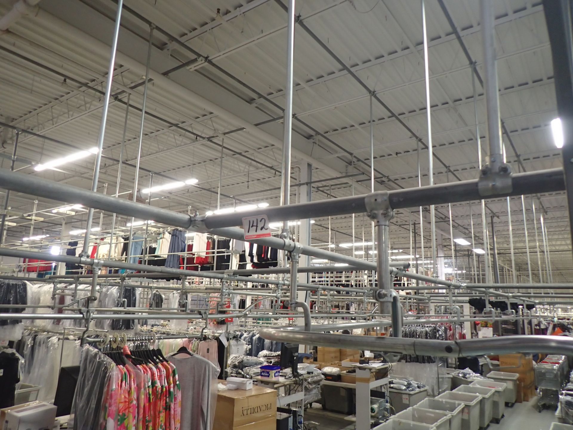 LOT - STEEL PIPE OVERHEAD STORAGE SYSTEM W/ TRAVEL HANGERS (APPROX. 1500')