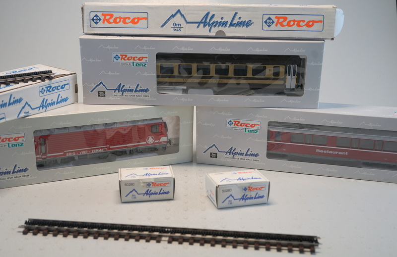 große Sammlung v. Roco Alpin Line-Wagen u. Schienenzubehör, 0m