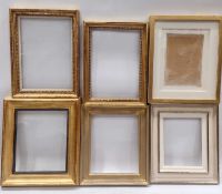 Six picture frames of composite construction.