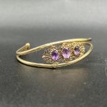 9ct yellow gold amethyst bangle with metal core