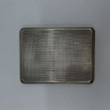 A silver cigarette case