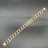 14ct yellow gold and diamond set large curb bracelet