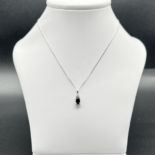 9ct white gold sapphire and diamond pendant