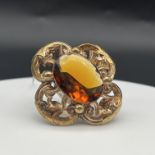 Large oval stone set brooch