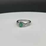 14ct white gold emerald and diamond ring