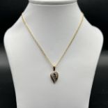 9ct yellow gold sapphire and diamond pendant and chain