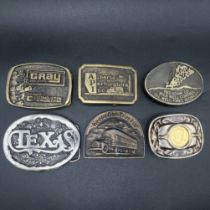 A collection of belt buckles