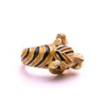 An enamel tiger head ring, composed of striped black and yellow enamel on a carved tiger head and