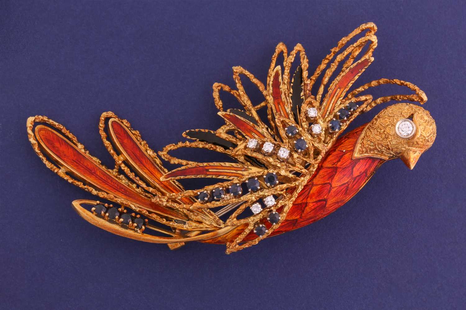 A sapphire and diamond phoenix brooch set in textured yellow metal with translucent orange enamel - Image 4 of 4