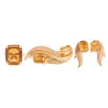 A citrine brooch, matching earrings and a ring en-suite; the brooch comprises two octagonal mixed-