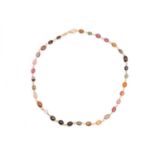 A multi-gem bead necklace in 18ct yellow gold, with polychromatic coloured tourmaline oval beads,
