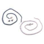 Two pearl necklaces, comprising a single strand graduated cultured pearl necklace, the silver tone