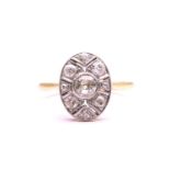 An Art Deco diamond panel ring, the oval panel centred with an old-European cut diamond of 4.5mm