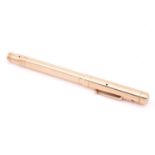 A Mabie Todd& Co Ltd Swan 9ct gold vacuum-filled fountain pen with engine turned decoration to the