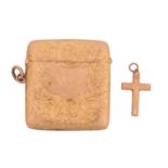 A 9ct yellow gold rectangular vesta case the cartouche engraved with a monogram on a foliate