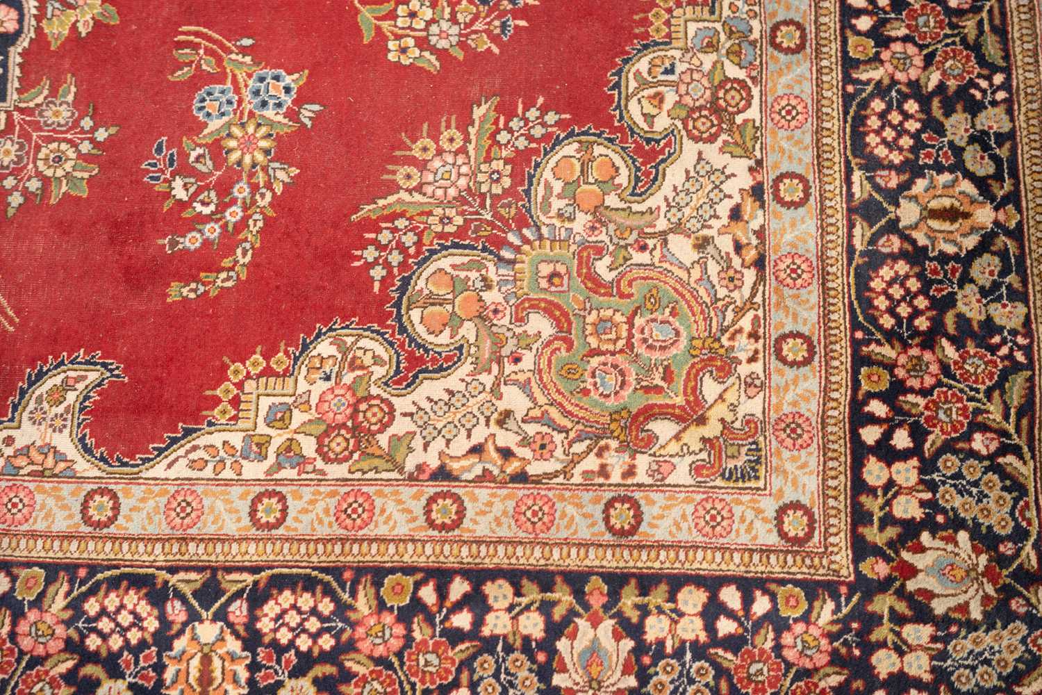 A red ground Tabriz carpet, 20th century, with a central polylobate "book-cover" design within - Image 3 of 6