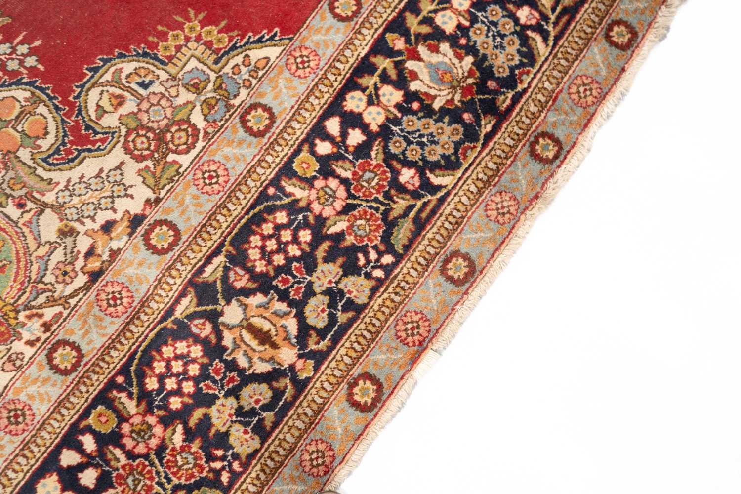 A red ground Tabriz carpet, 20th century, with a central polylobate "book-cover" design within - Image 5 of 6