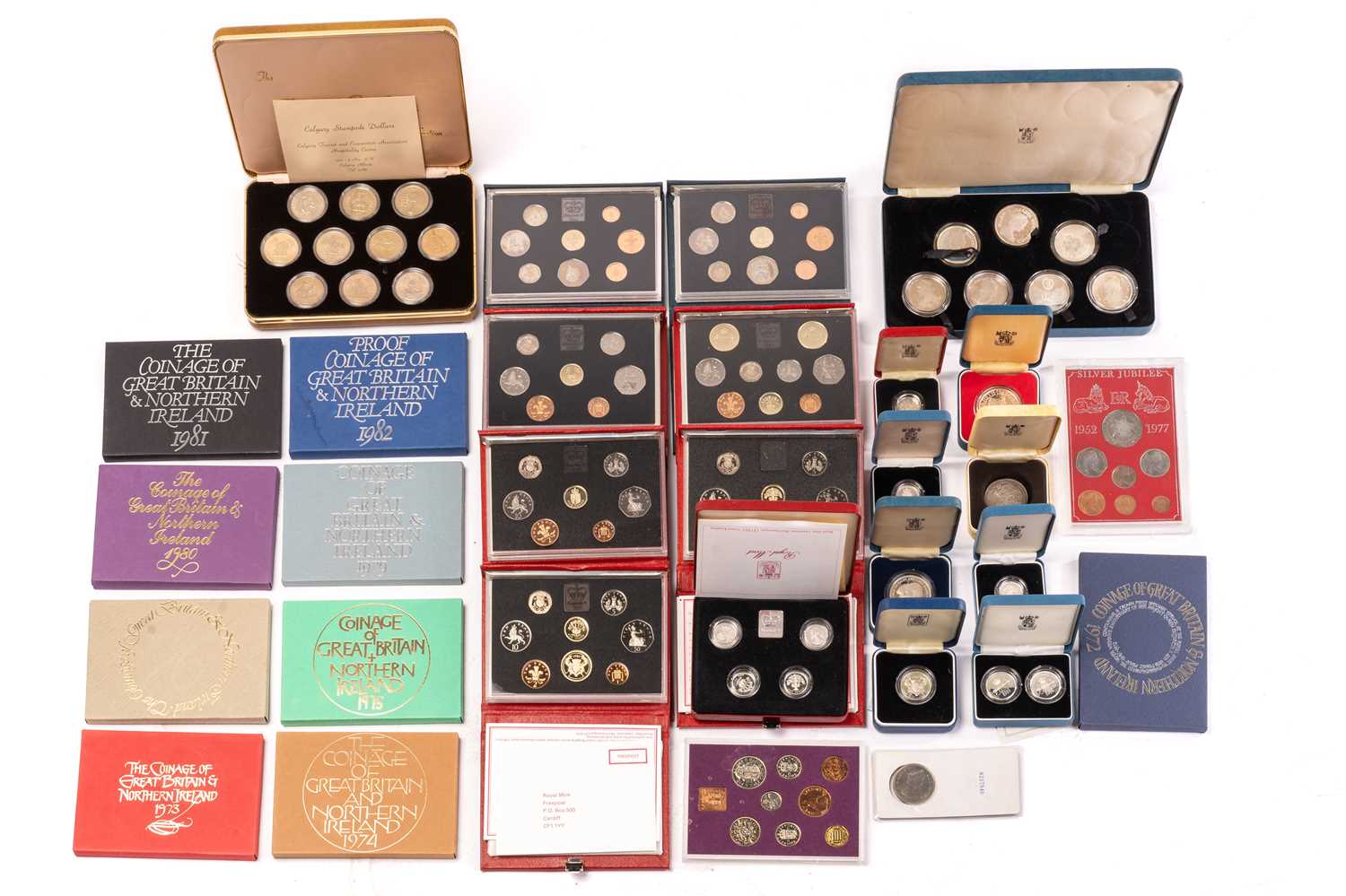 A collection of silver proof and other coins, comprising The Coinage of Great Britain 1970 - 1989 (